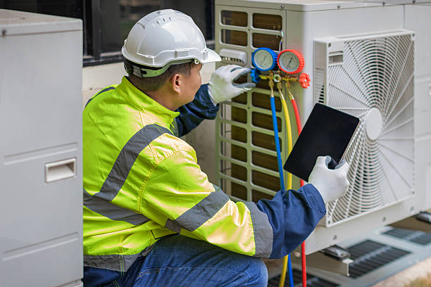 Professional Air Conditioning Repair technician working in Bellaire, TX